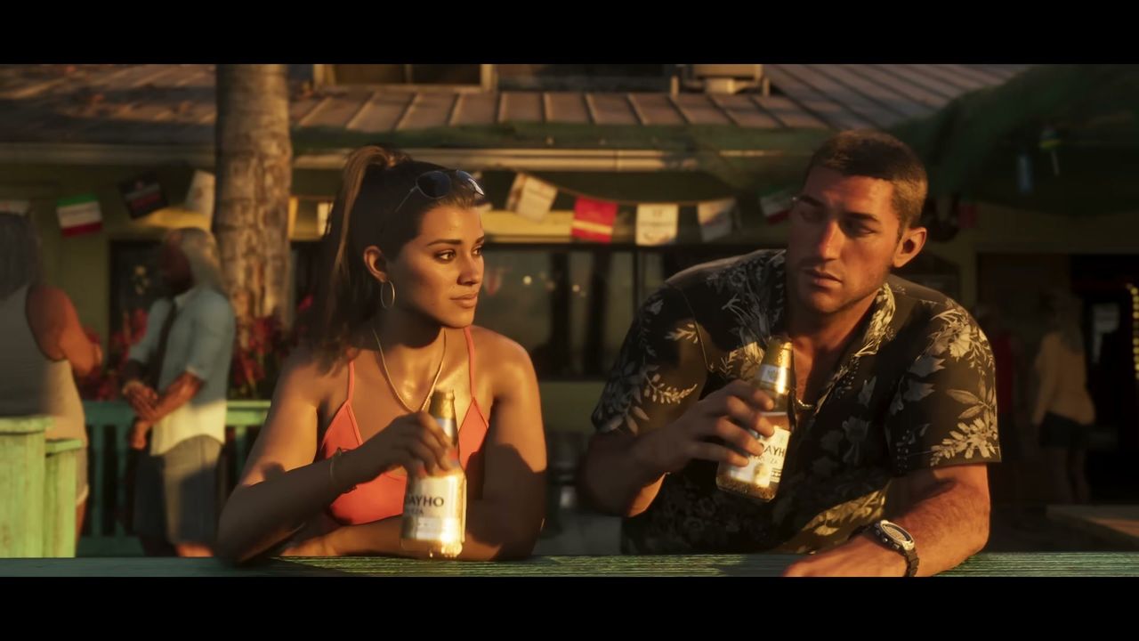 Jason and Lucia are sitting at an outdoor bar or counter, both holding bottles of beer, with other…