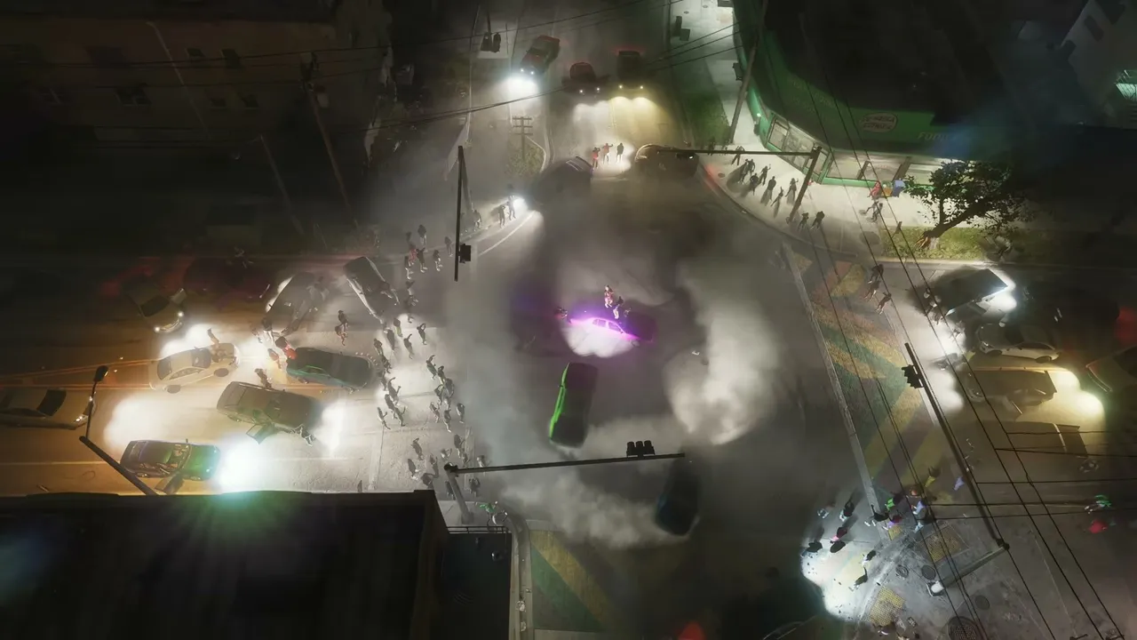 An aerial view shows a chaotic night street scene with numerous cars, some crashed, and a large…
