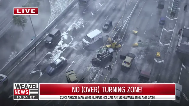 An aerial view shows a multi-lane highway with a flipped car, debris, and several other vehicles, including…