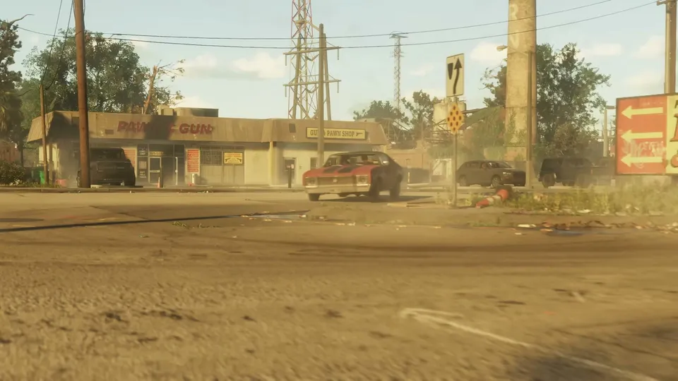 A red muscle car drives past a "Pawn & Gun" shop on a dusty street with power lines overhead.