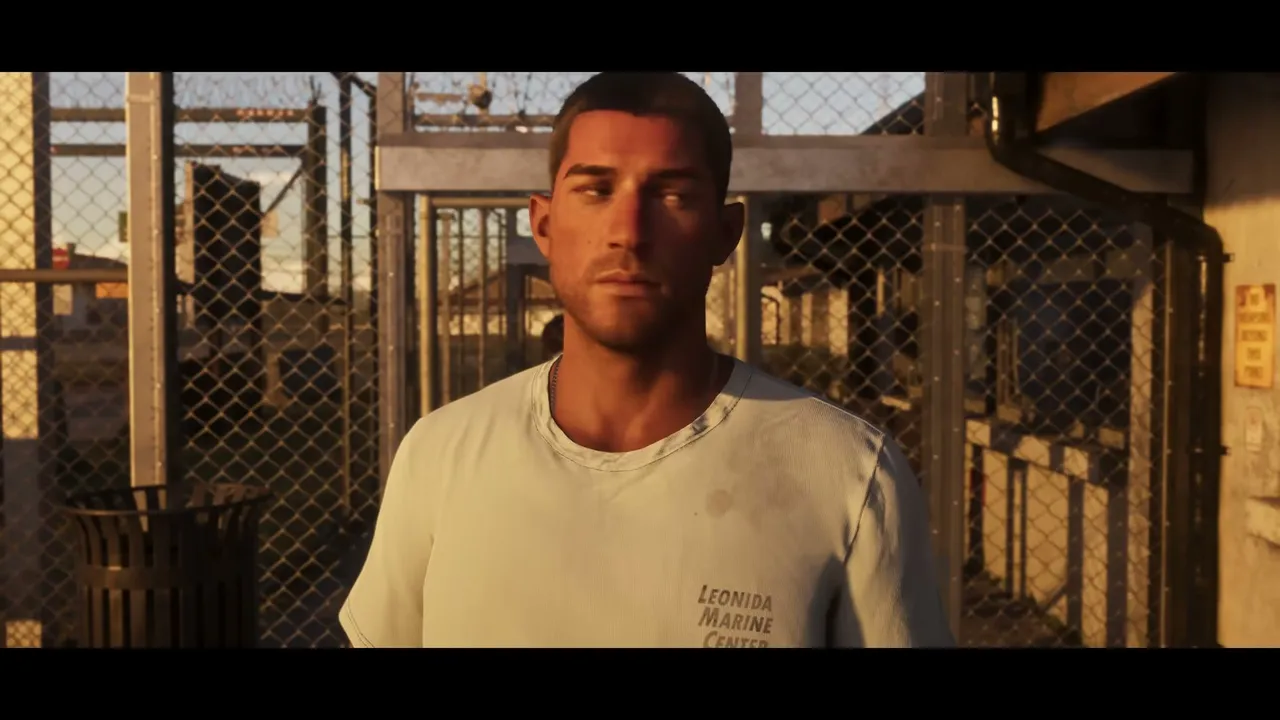 Jason Duval stands looking forward, wearing a light blue t-shirt with 'LEONIDA MARINE CENTER'…
