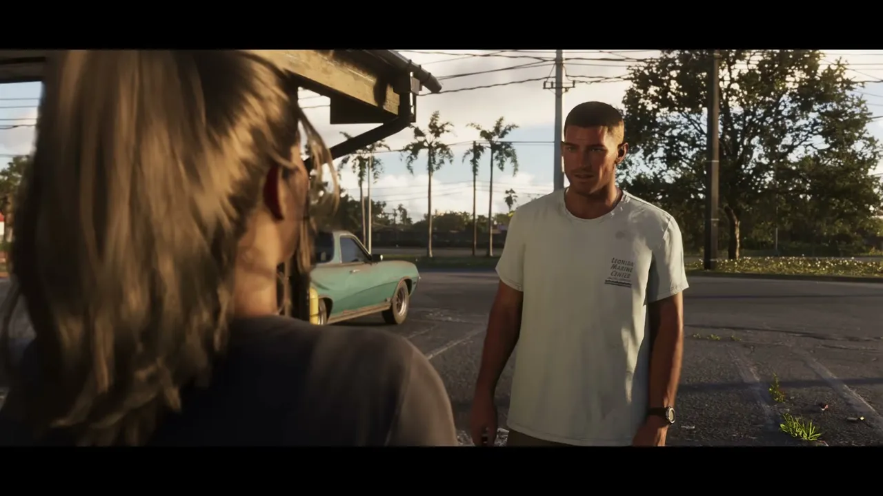 Jason Duval stands in a parking lot or street, wearing a 'Leonida Marine Center' t-shirt, looking…